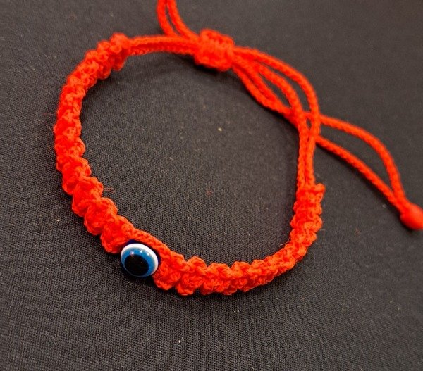 Producto - Pulsera roja tejida ajustable Ojo Turco diametro 9 cm
