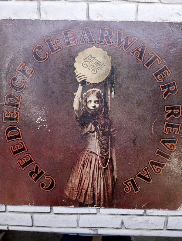 Producto - Creedence Clearwater Revival Mardi Gras
