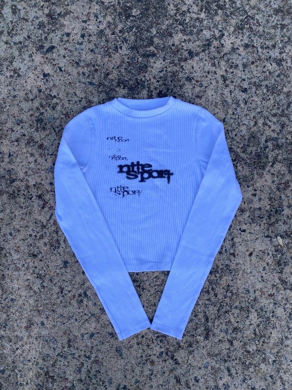 Producto - Top mangas largas nite sport