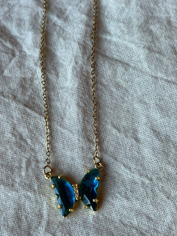 Producto - collar mariposa dorada azul