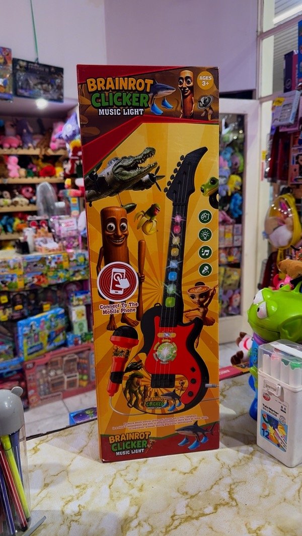 Producto - GUITARRA Y MICRÓFONO TRALALERO