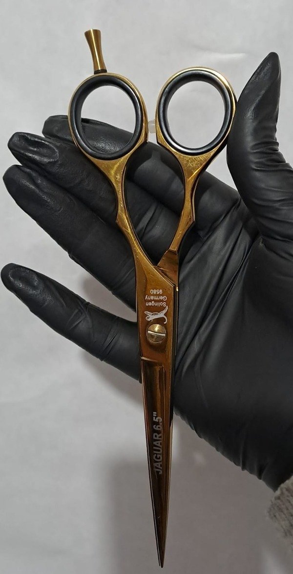 Producto - TIJERA JAGUAR DE CORTE DORADA 6.5