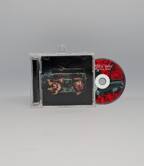 Producto - Revolution Radio - Llavero CD