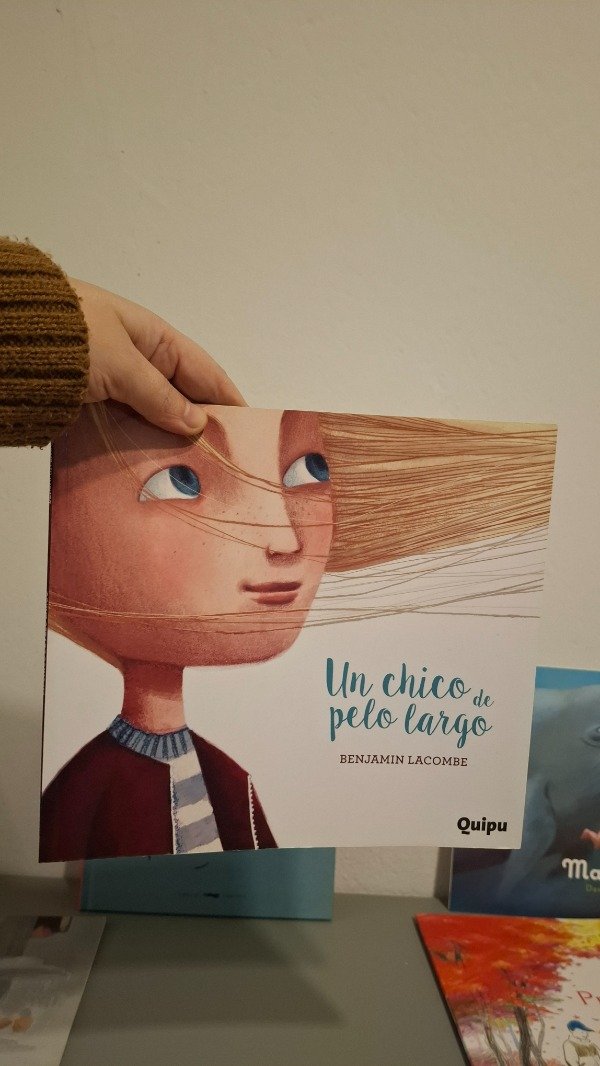 Producto - Un chico de pelo largo