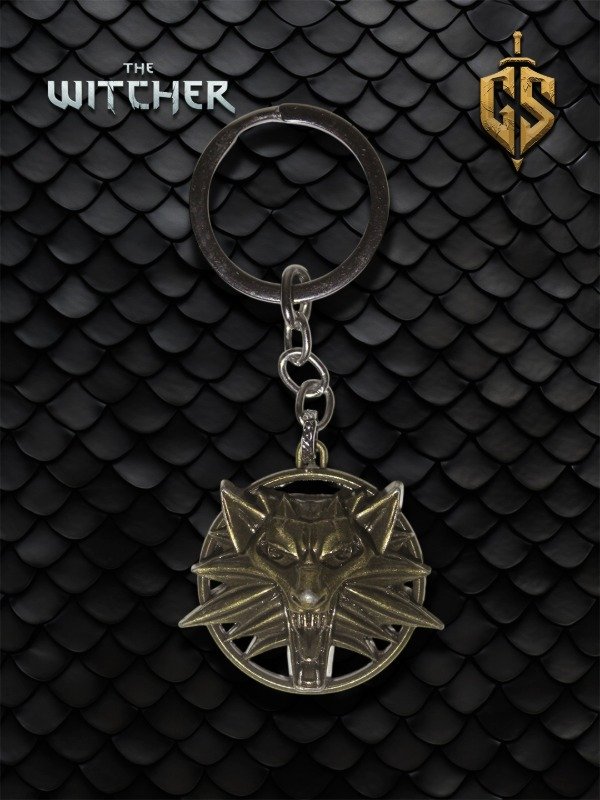 Producto - Llavero de metal dorado Medallón del Lobo - The Witcher