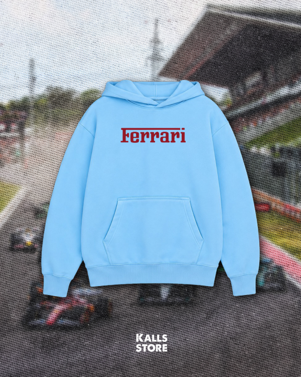 Buzo celeste con bordo Ferrari