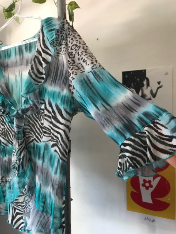 Blusa animal print — imagen 3