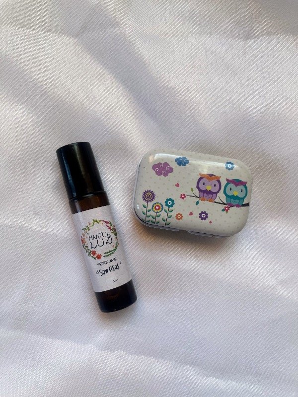 Producto - Combo perfume sonrisas roll on y bálsamo en Latita bhuo
