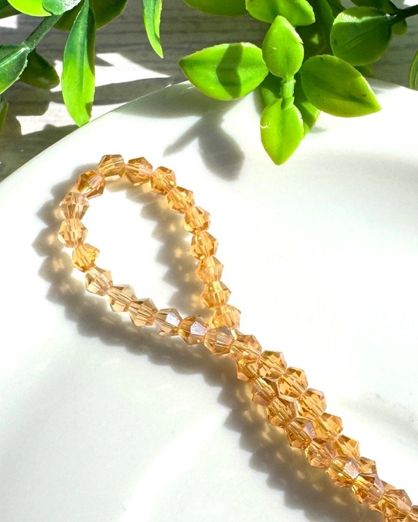 Producto - TIRA CRISTAL DE ROCA BICONO TE 4MM