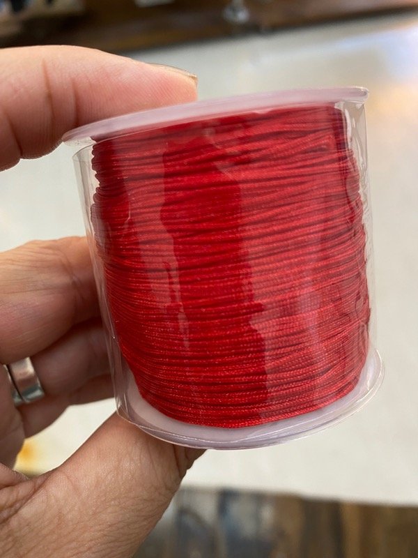 Producto - Hilo chino rojo.