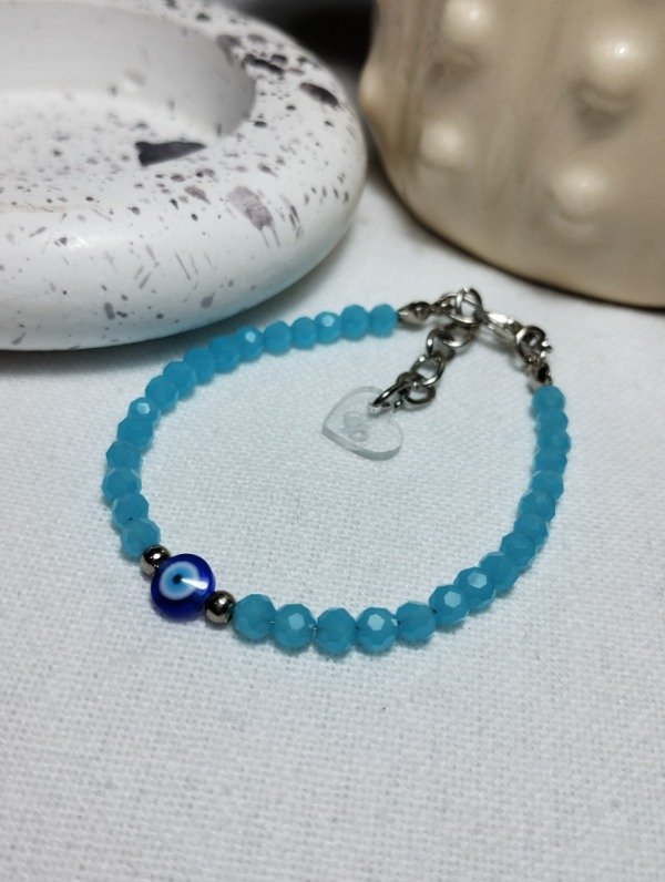 Producto - Pulsera de cristales celestes ojo turco