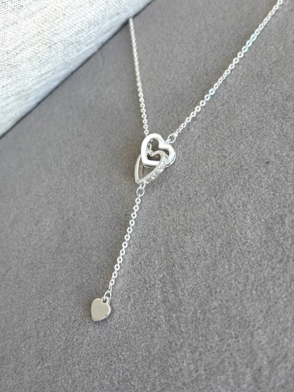 Producto - Collar Corazones Enlazados Acero Blanco