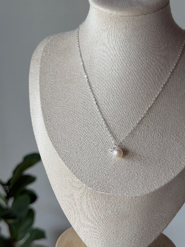 Producto - Cadena con dije perla + punto de luz - 1