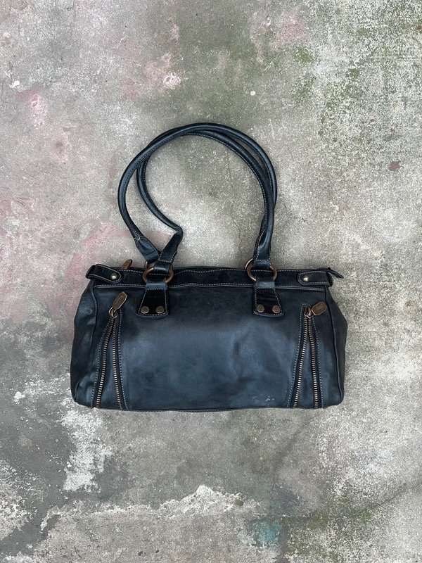 Producto - Minibag Cuero Prune