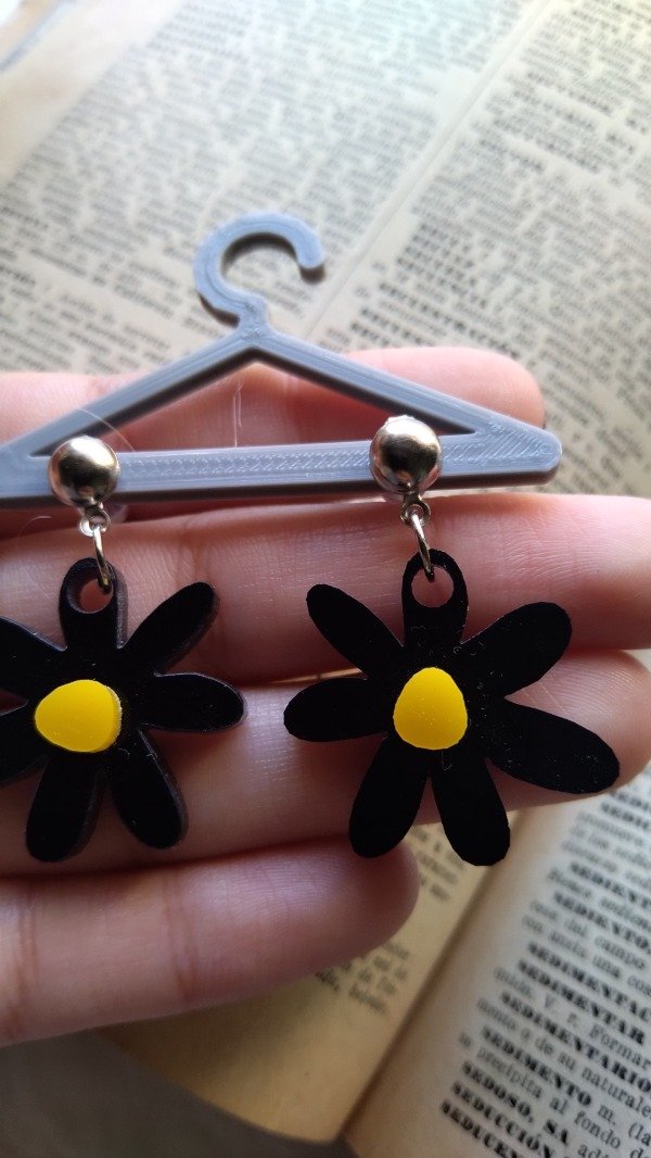 Producto - Aros margarita negros (semi fijos)