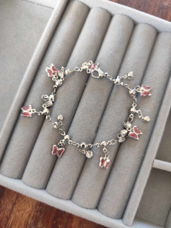 Producto - Pulsera multi mariposas strass rosa. Acero quirúrgico.