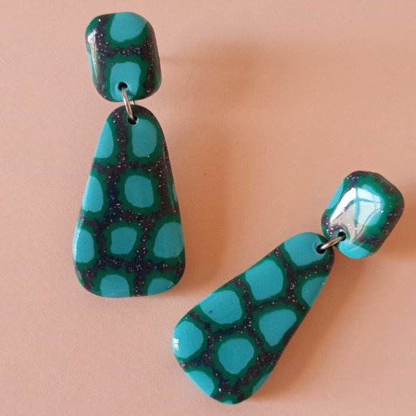 Producto - Triángulos con fondo glitter