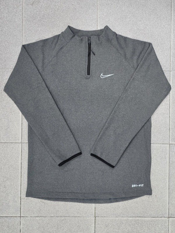 Producto - Buzo Micropolar Medio Cierre Nike Gris