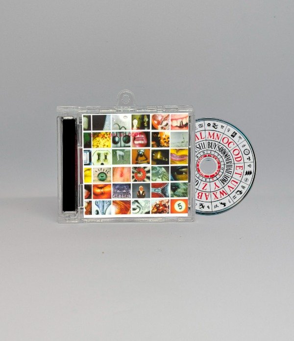 Producto - No Code - Llavero CD