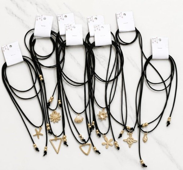 Producto - CORBATEROS DIJES CHICOS