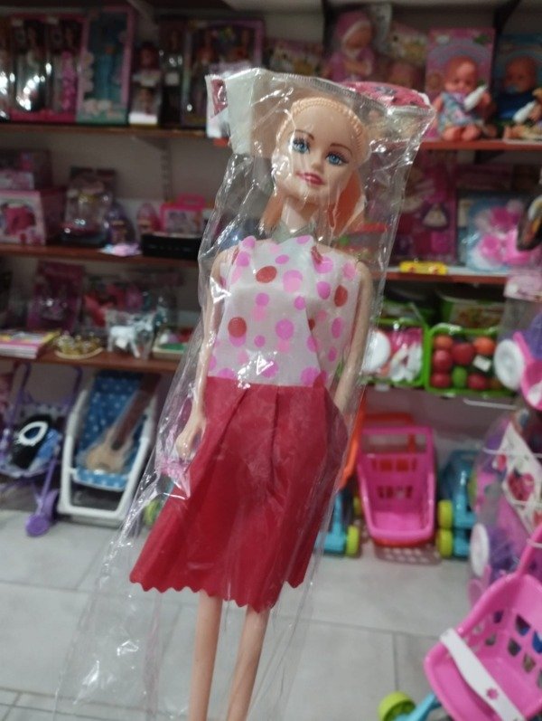 Producto - Muñeca rigida con vestido en bolsa