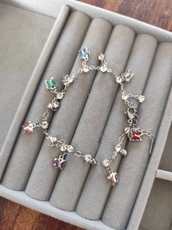 Producto - Pulsera multi mariposas strass. Acero quirúrgico
