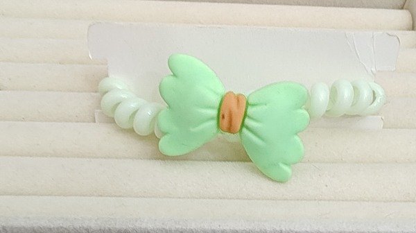 Producto - Colita Wire Moños verde