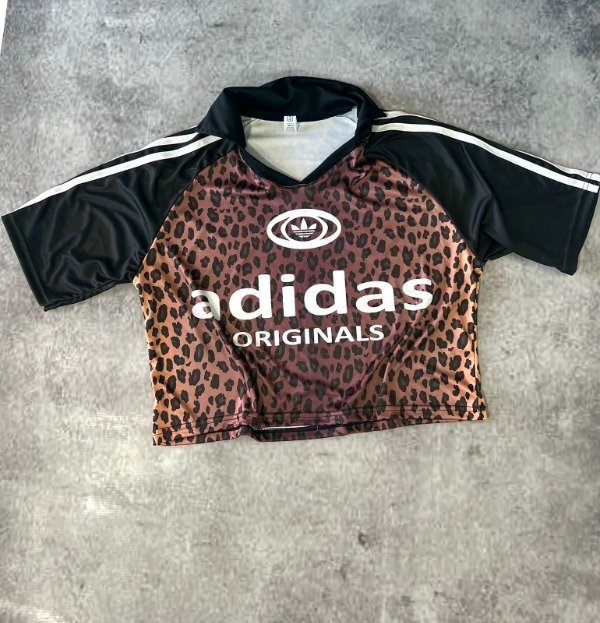Producto - CHOMBA ANIMAL-PRINT