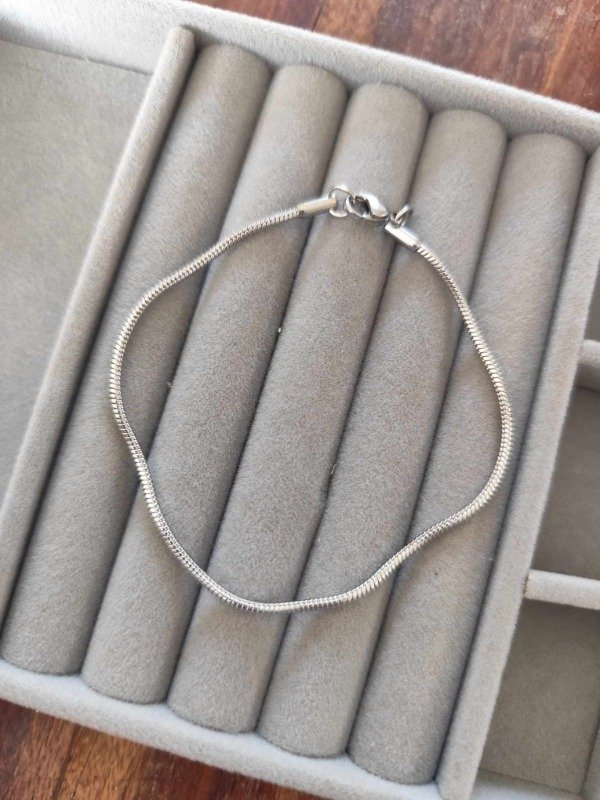 Producto - Pulsera cola de ratón fina. Acero quirurgico.