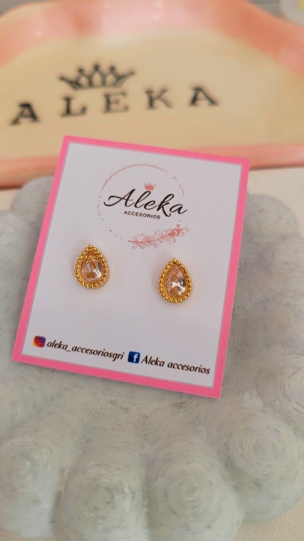 Producto - Aros gotas cubic blanco de acero dorado - 1