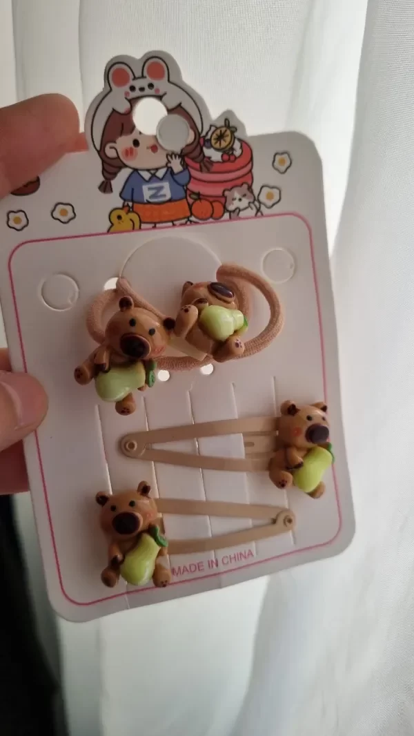 Producto - Set capibara hebillas + chuflos