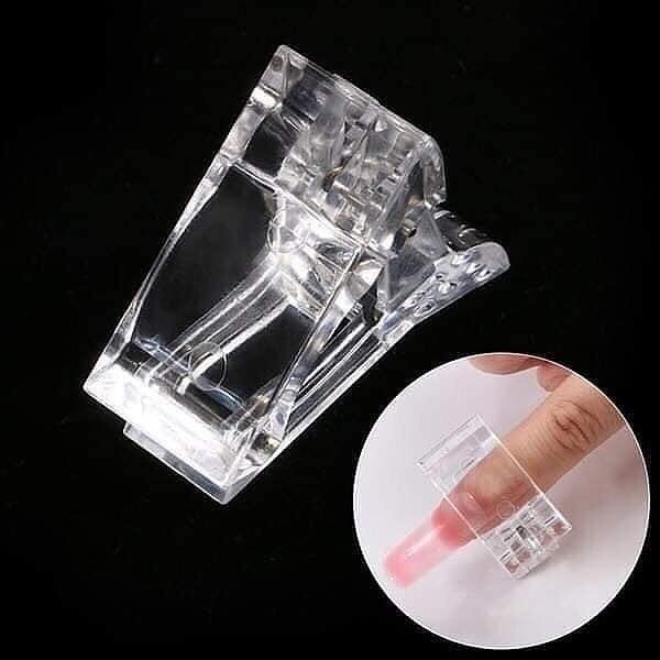 Producto - Broche sujeta capsula para dual system x unidad