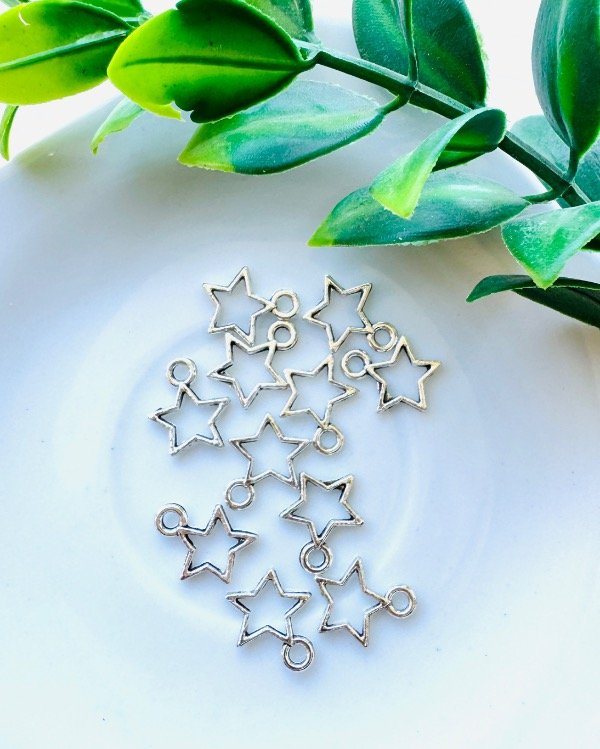 Producto - DIJE ESTRELLITA PLATA CALADA  MUNDIAL