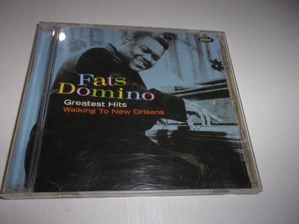 Producto - CD FATS DOMINO GREATEST HITS WALKING TO NEW ORLEANS ARG 32D