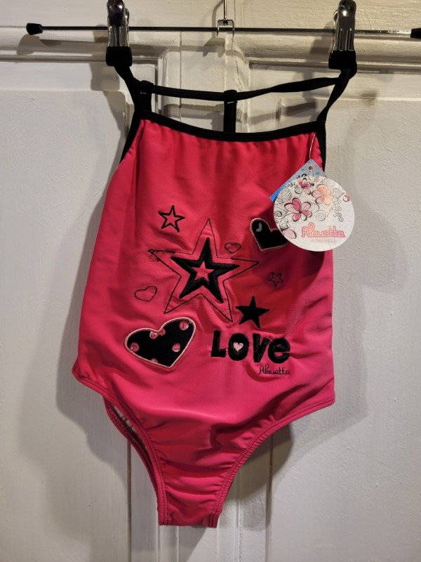 Producto - Traje de baño ALOUETTE fucsia Nuevo Con etiqueta Talle 10 años - PRECIO: 18X