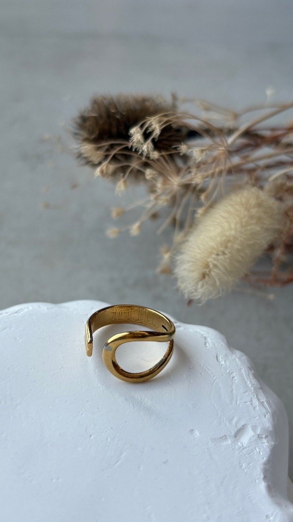 Producto - Anillo de acero dorado regulables l o