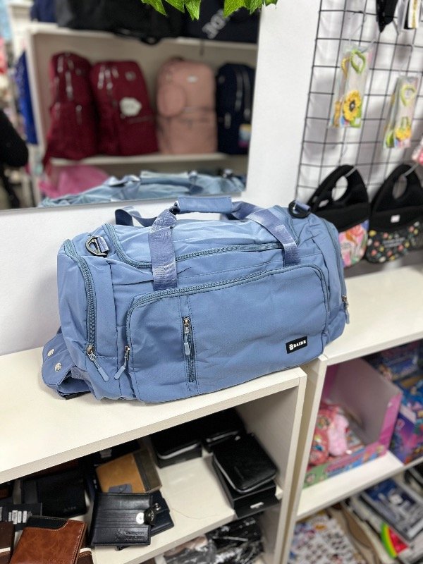 Producto - Bolso mochila de viaje celeste pastel