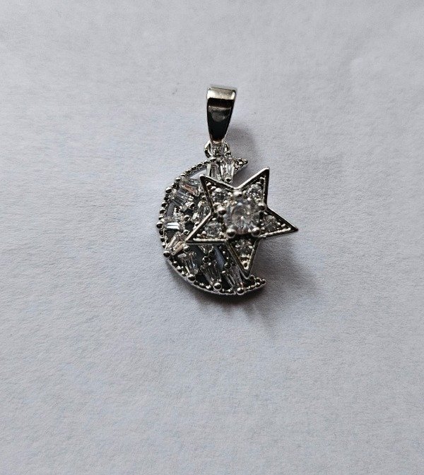 Producto - Dije giratorio luna estrella