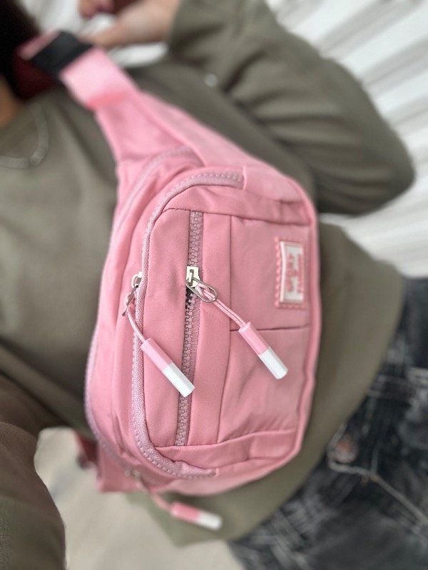 Producto - Riñonera impermeable rosa bebe