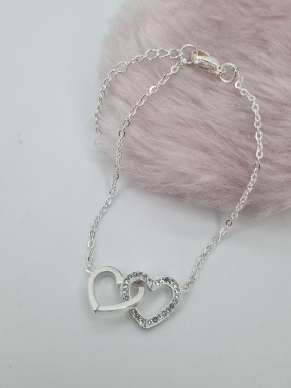 Producto - Pulsera acero blanco dije doble corazón entrelazado strass
