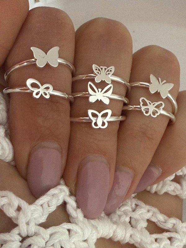 Producto - NB782 Anillo mariposa acero blanco modelos surtidos