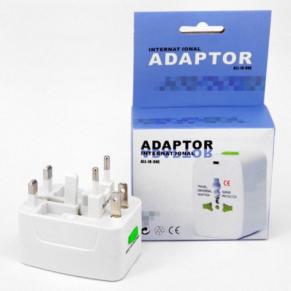 Producto - Adaptador Enchufe Universal Viajero Viaje Turismo 110/220v