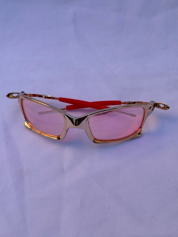 Producto - LENTES BR METAL DORADO CON ROSADO