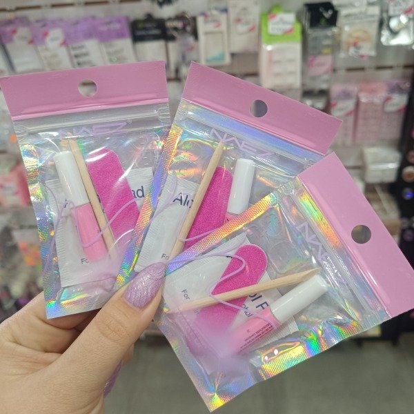 Producto - Kit para press on en bolsita con adhesivo rosa