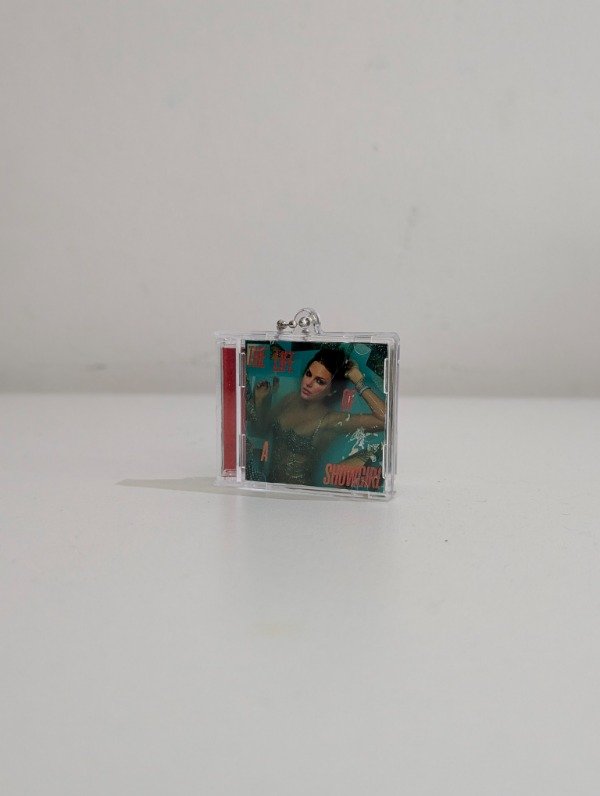 Producto - The Life of a Showgirl - Llavero CD