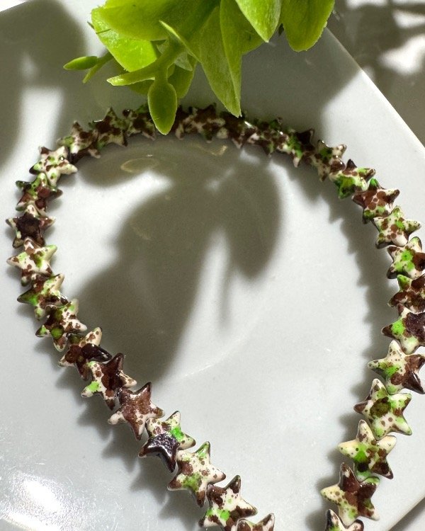 Producto - TIRA ESTRELLITA PIEDRAS CHOCO