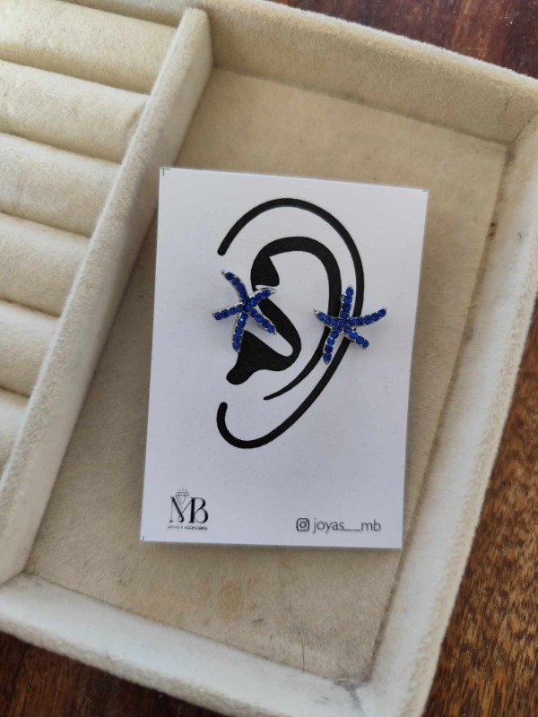 Producto - Aros estrella pasante strass azul. Acero quirúrgico.