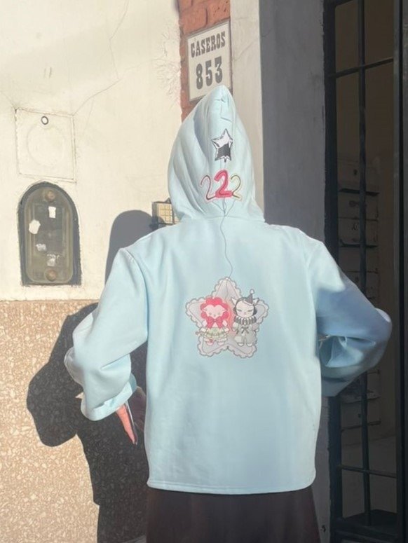 Producto - buzo arlequines celeste