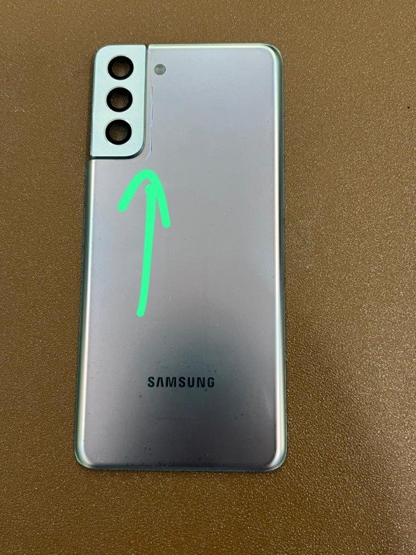 Producto - TAPA SAMSUNG S21 PLUS DE EQUIPO, LEVE DESPINTADA. DE EQUIPO