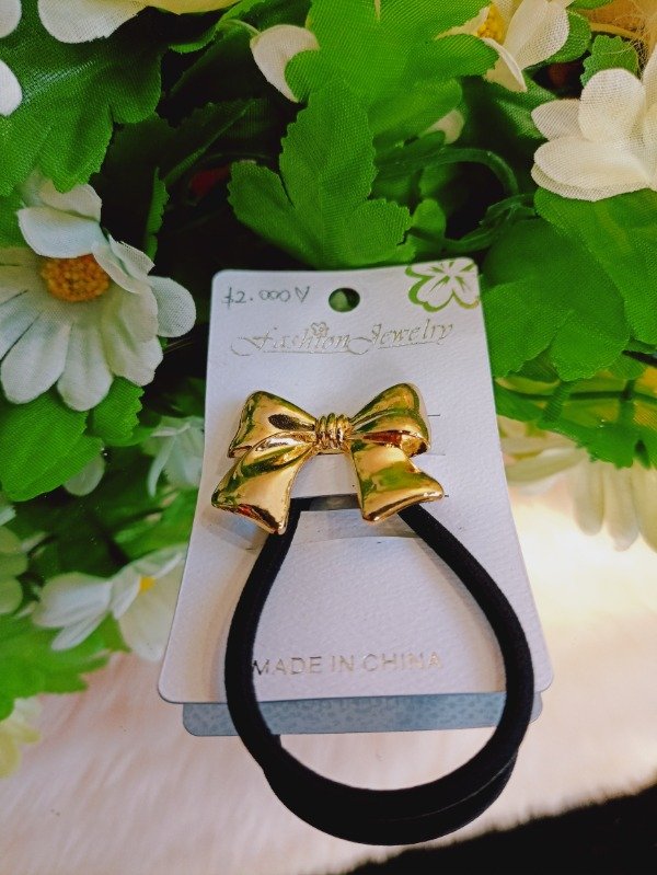Producto - Colita moño dorado
